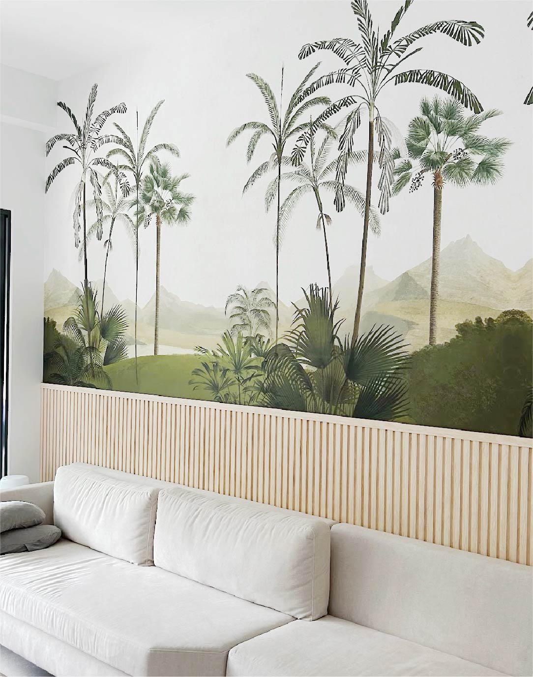 a side of living room covered with tropical island wallpaper by Honpo